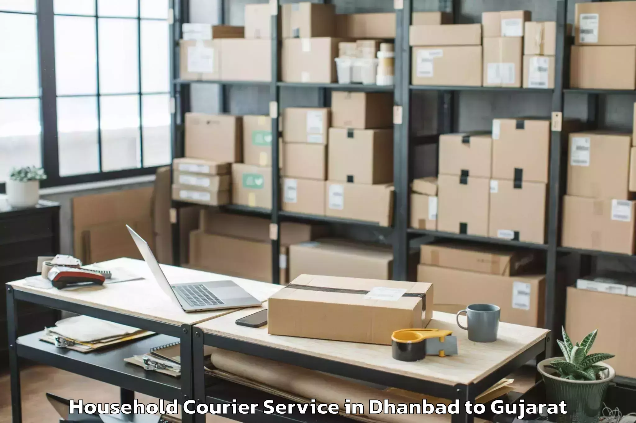 Top Dhanbad to Kodinar Household Courier Available